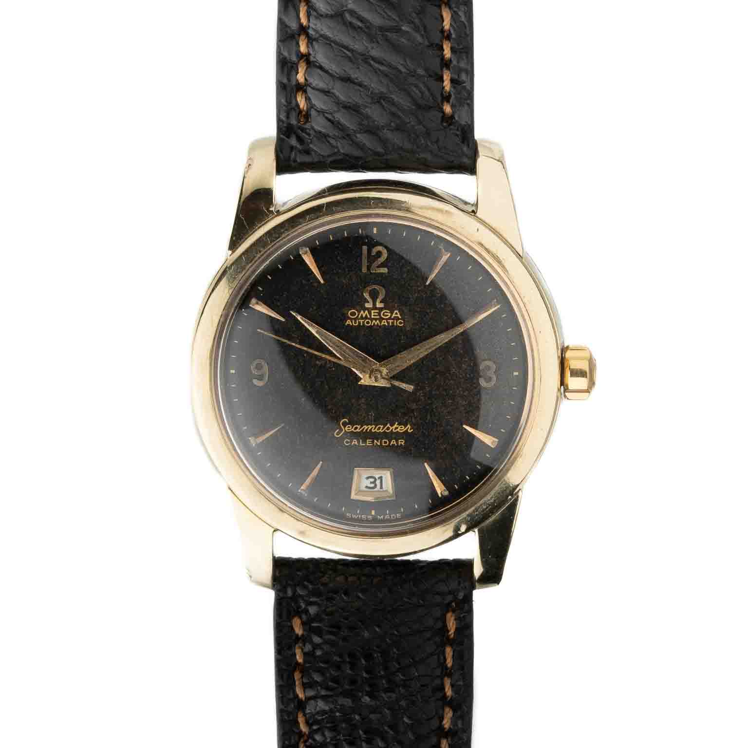 Vintage Omega Seamaster calandar with patinated black dial gold capped 2757-11 from 1955