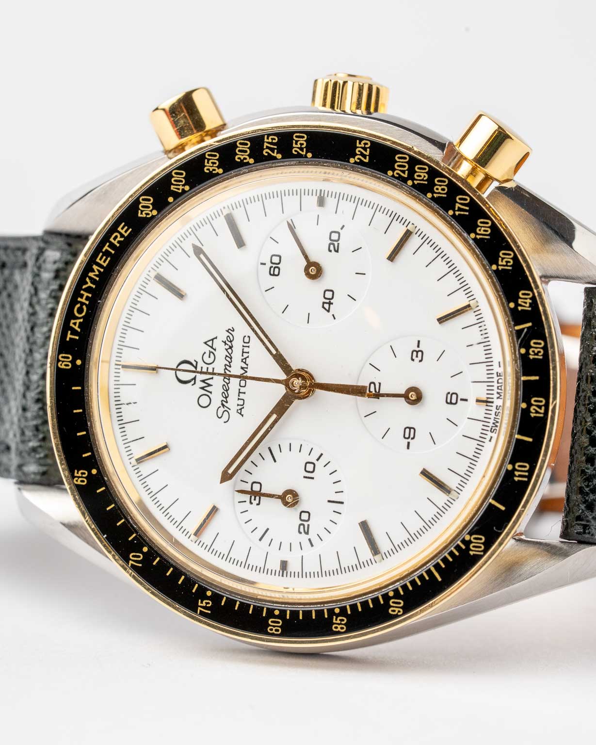 Vintage Omega Speedmaster Reduced two-tone white dial 175.0032 from 1990s watch dial