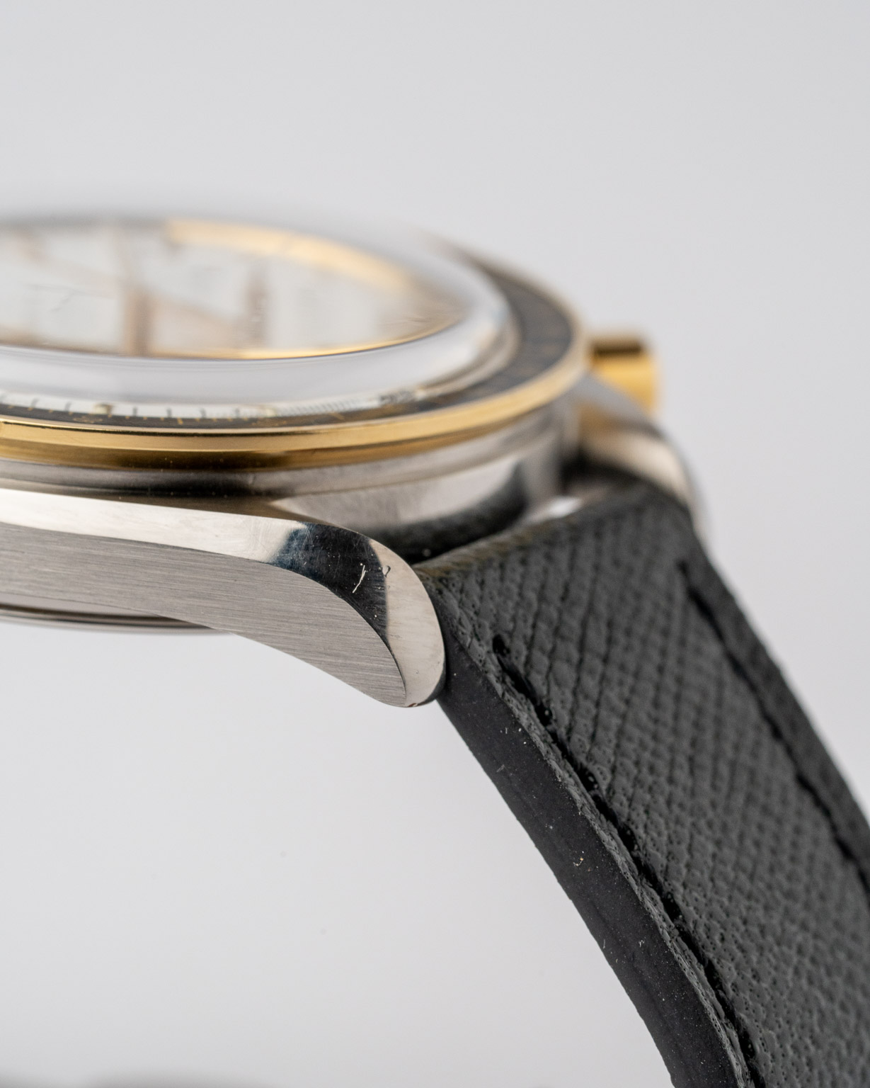 Vintage Omega Speedmaster Reduced two-tone white dial 175.0032 from 1990s watch lugs