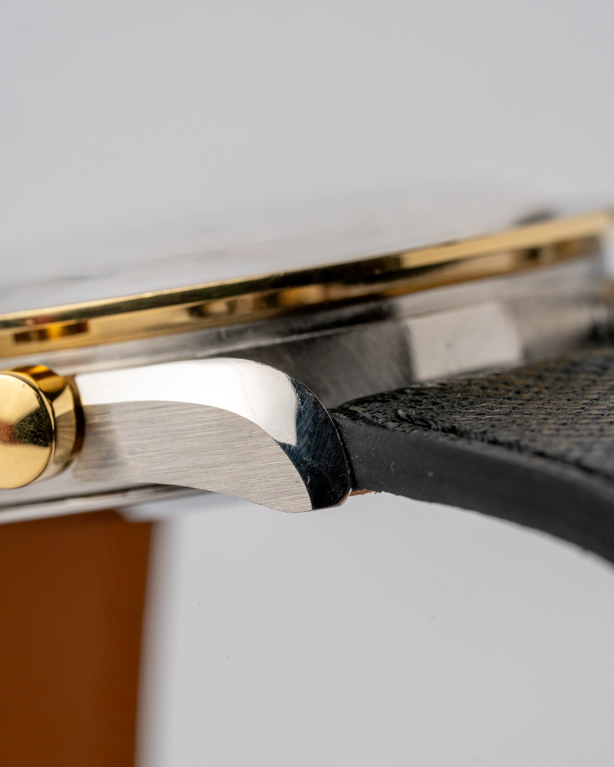 Vintage Omega Speedmaster Reduced two-tone white dial 175.0032 from 1990s watch pusher