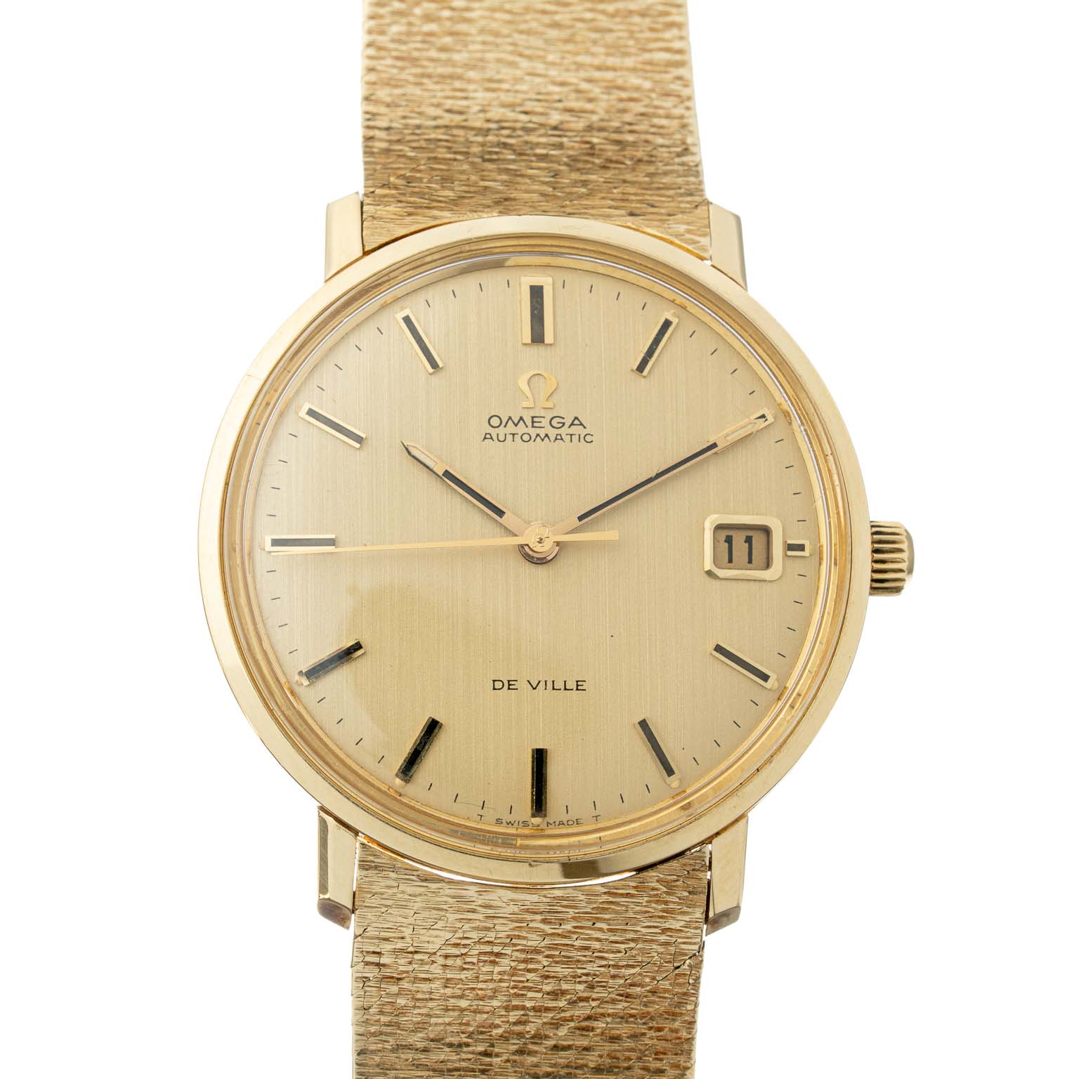 Vintage Omega De Ville brushed champagne dial with rare 14k Omega bracelet 166.033 from 1960s watch front