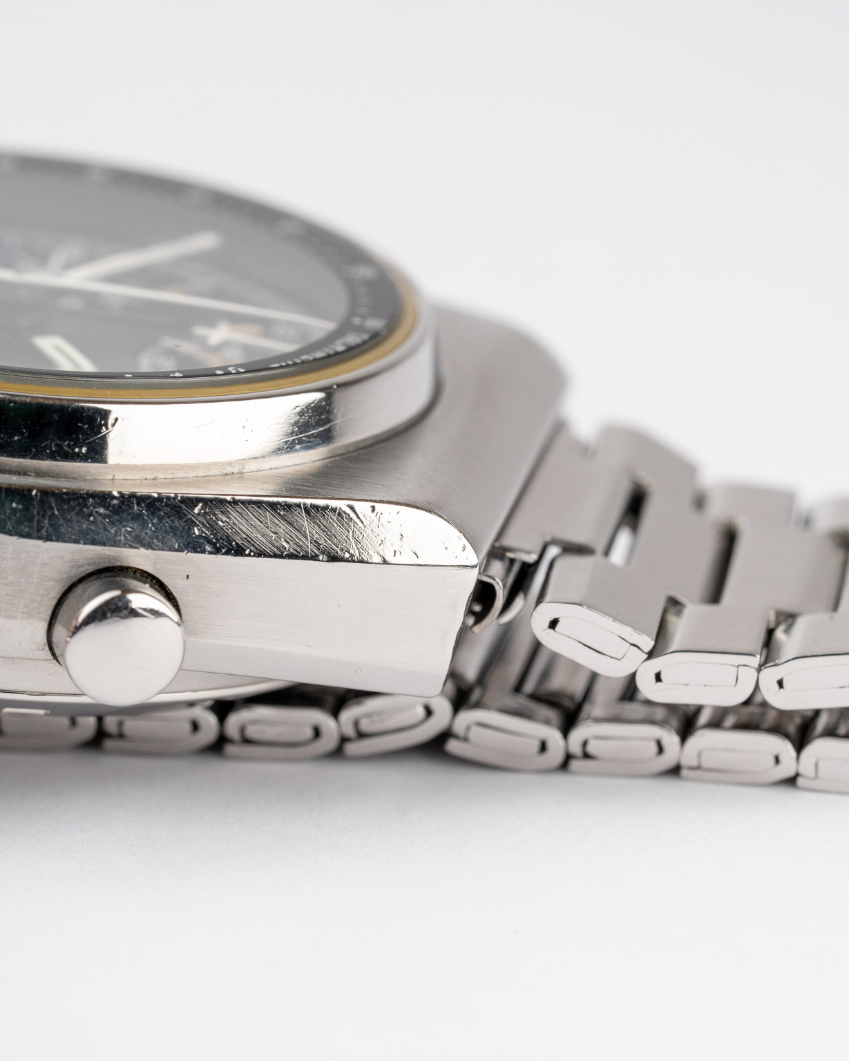 Vintage Omega Speedmaster Automatic Mark IV with black dial 176.0015 from 1975 watch pusher