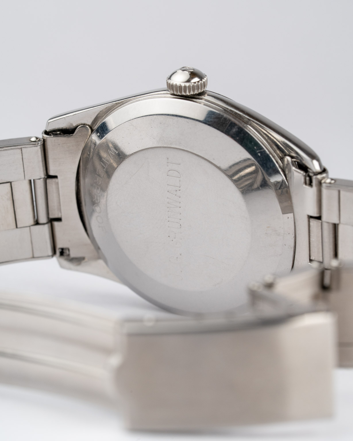 Vintage Omega Seamaster with black dial with patina in steel reference 2869 with steel bracelet from 1956 watch caseback