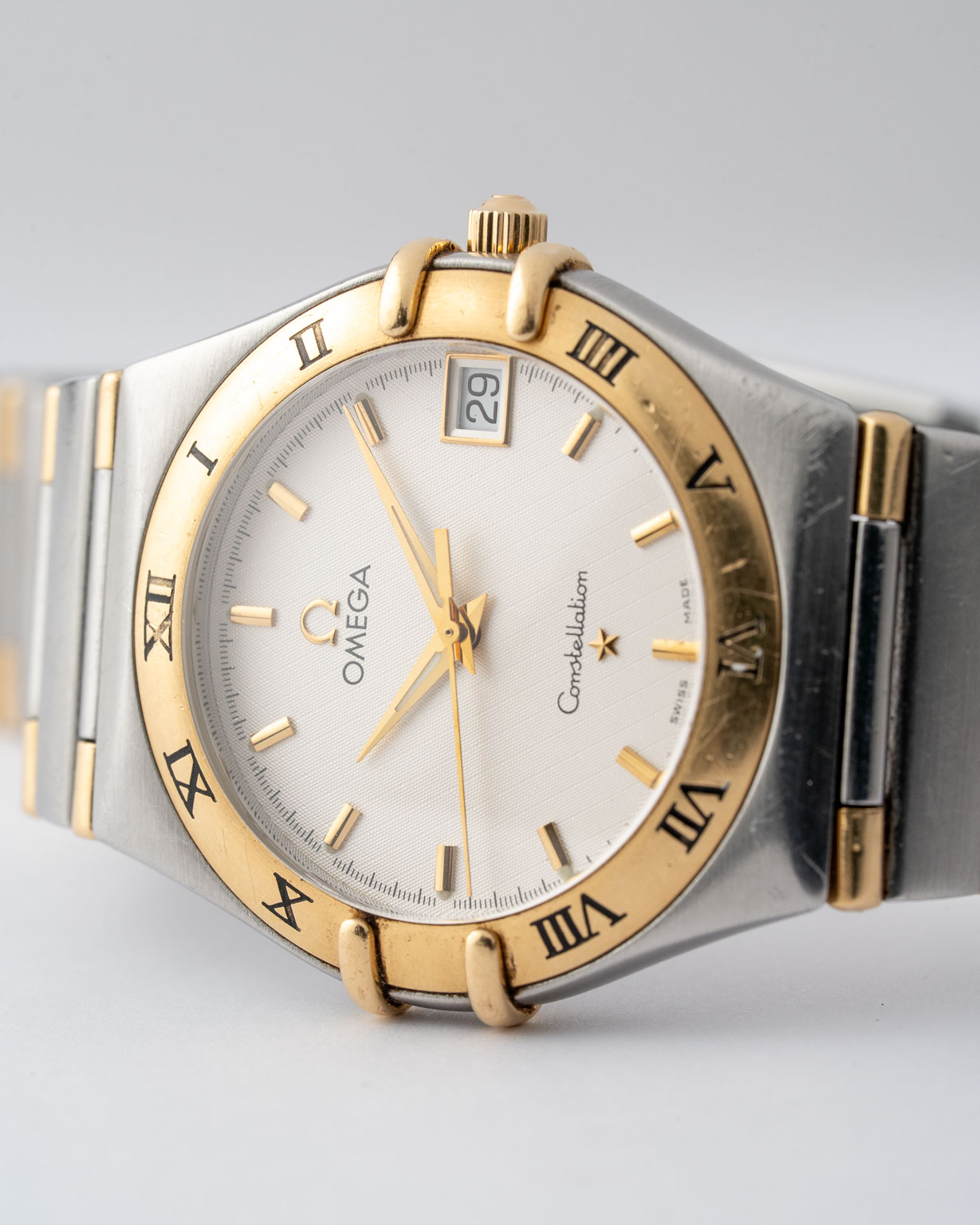 Vintage Omega Constellation Manhattan quartz for Ladies with honeycomb dial 13123000 from 2002 watch dial