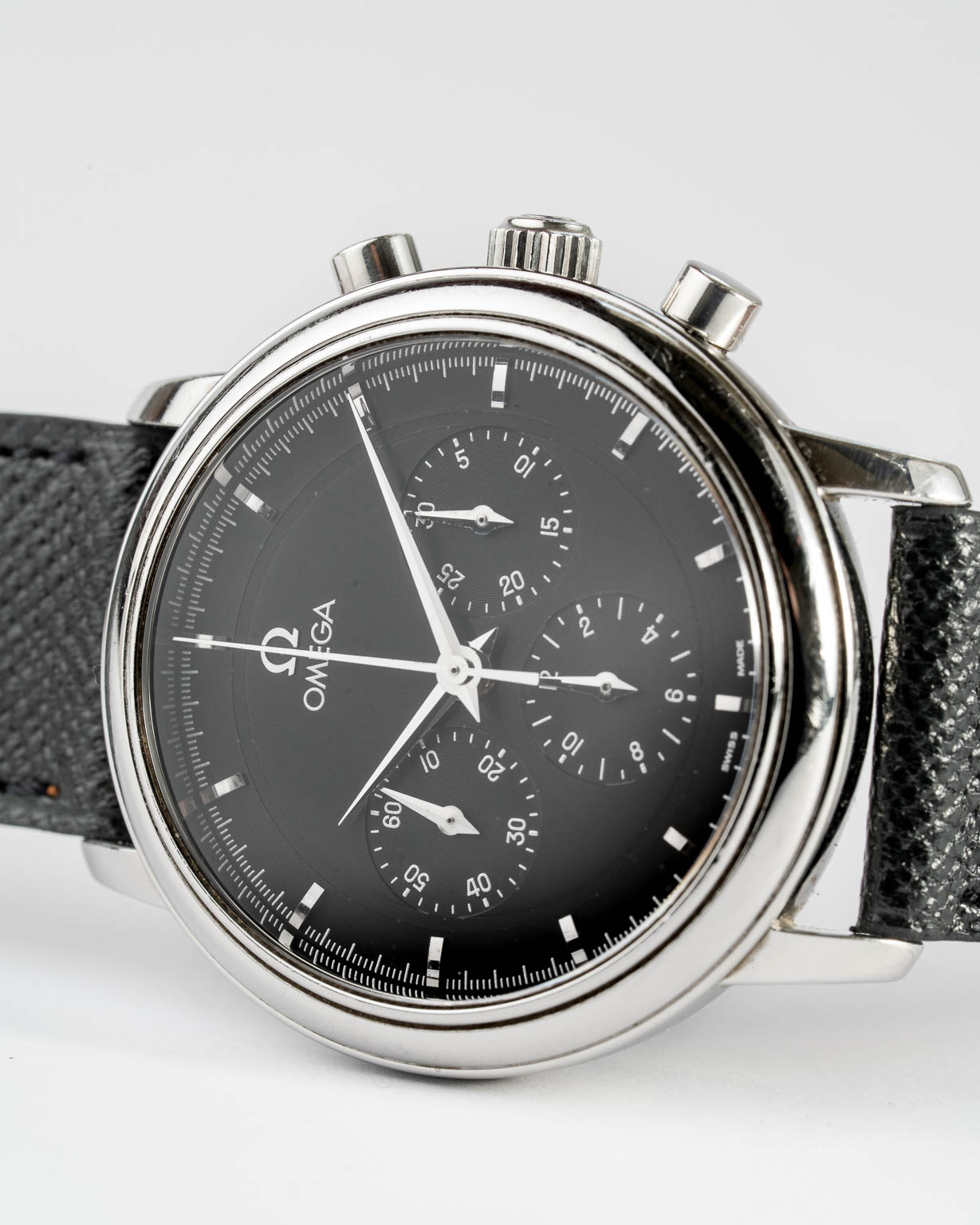 Vintage Omega De Ville Chronograph with black dial in stainless steel Cal 861 reference 4840 from 1995 laying photo