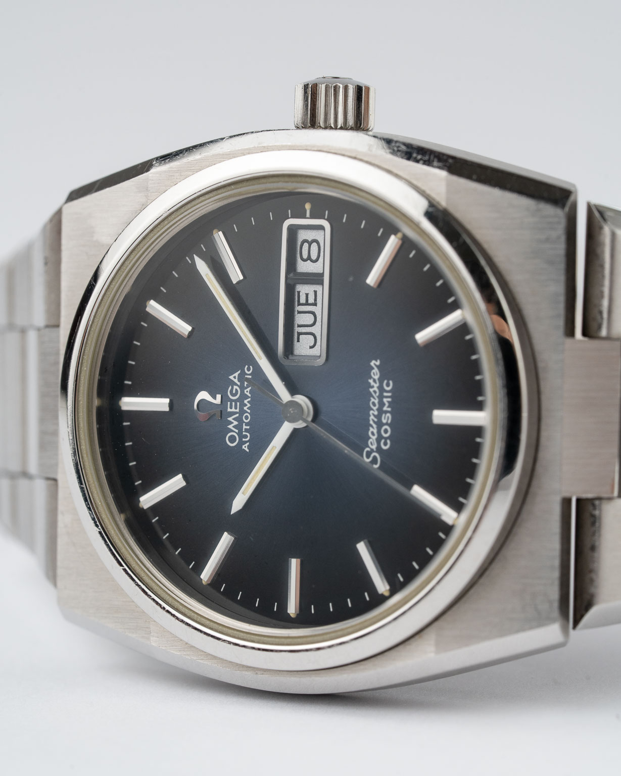 Vintage Omega Seamaster Cosmic Day Date with blue dial NOS 166.0196 from 1970s laying