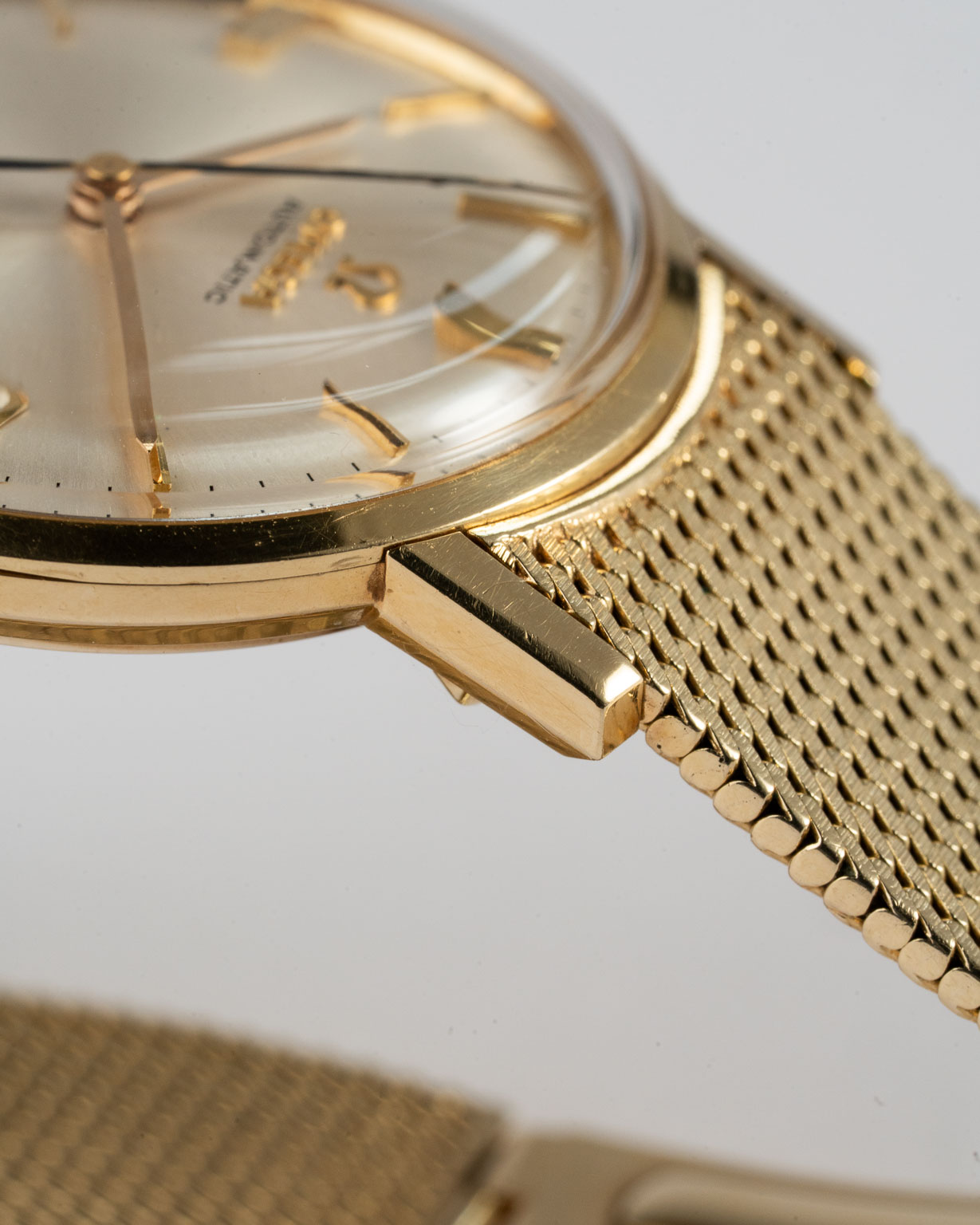 vintage omega seamaster 166.020 14k gold case and bracelet lug