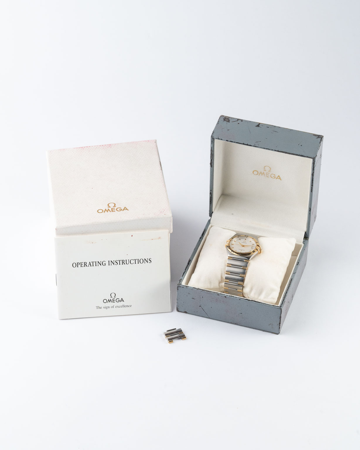 Vintage Omega Constellation Manhattan Two-Tone quartz with honeycomb dial 396.1201 from 1998 watch box