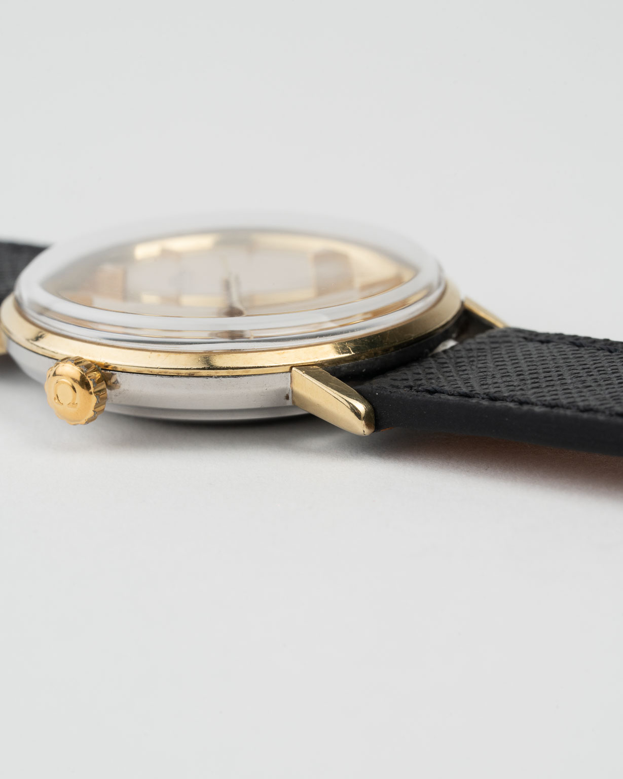 Vintage Omega Seamaster white dial with gold capped case reference 14765 from 1960s watch side case