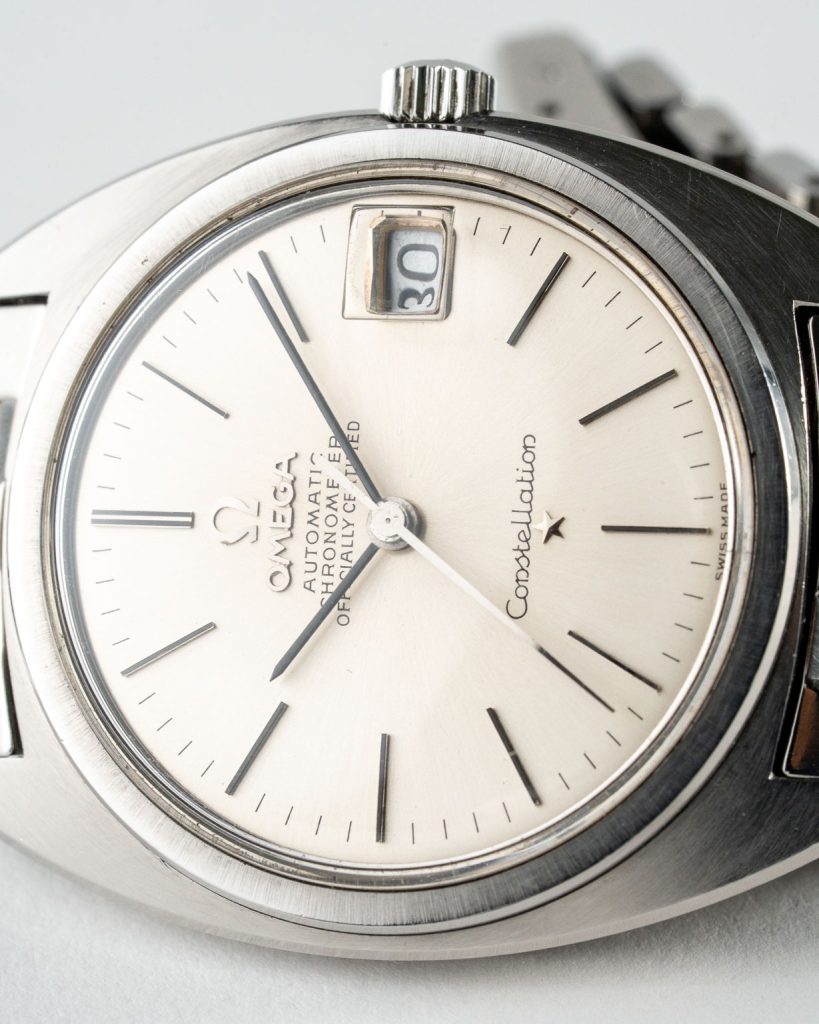 Vintage Omega Constellation C-shape with white dial in stainless steel case with brick bracelet reference 168.017 from 1969 watch dial