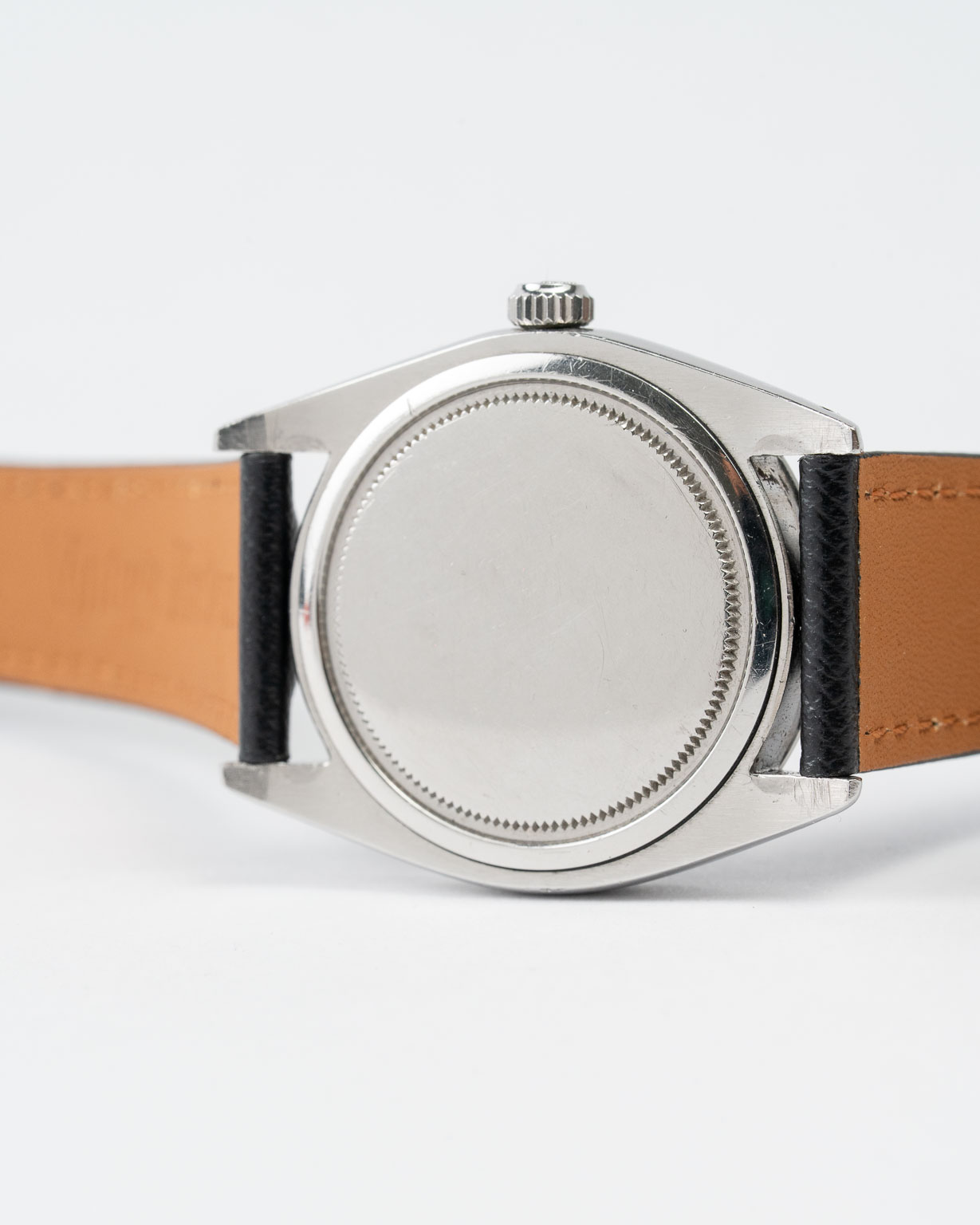 Vintage Rolex Oysterdate Precision 6694 stainless steel Black Gilt (tropical) dial on leather strap from 1953 caseback