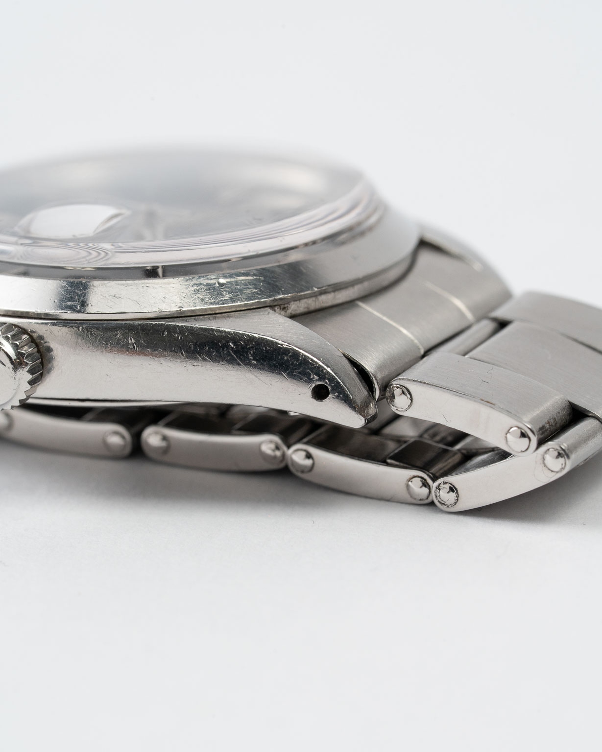 Vintage Rolex Oysterdate Precision 6694 stainless steel Black Gilt (tropical) dial on riveted oyster from 1953 lug 4