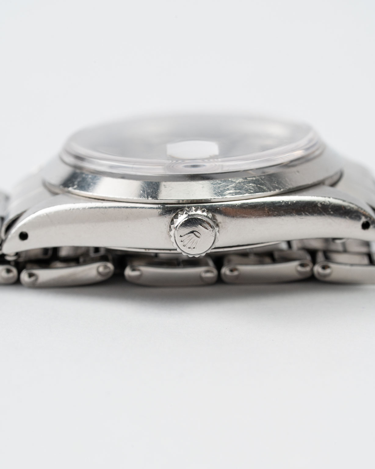 Vintage Rolex Oysterdate Precision 6694 stainless steel Black Gilt (tropical) dial on riveted oyster from 1953 crown