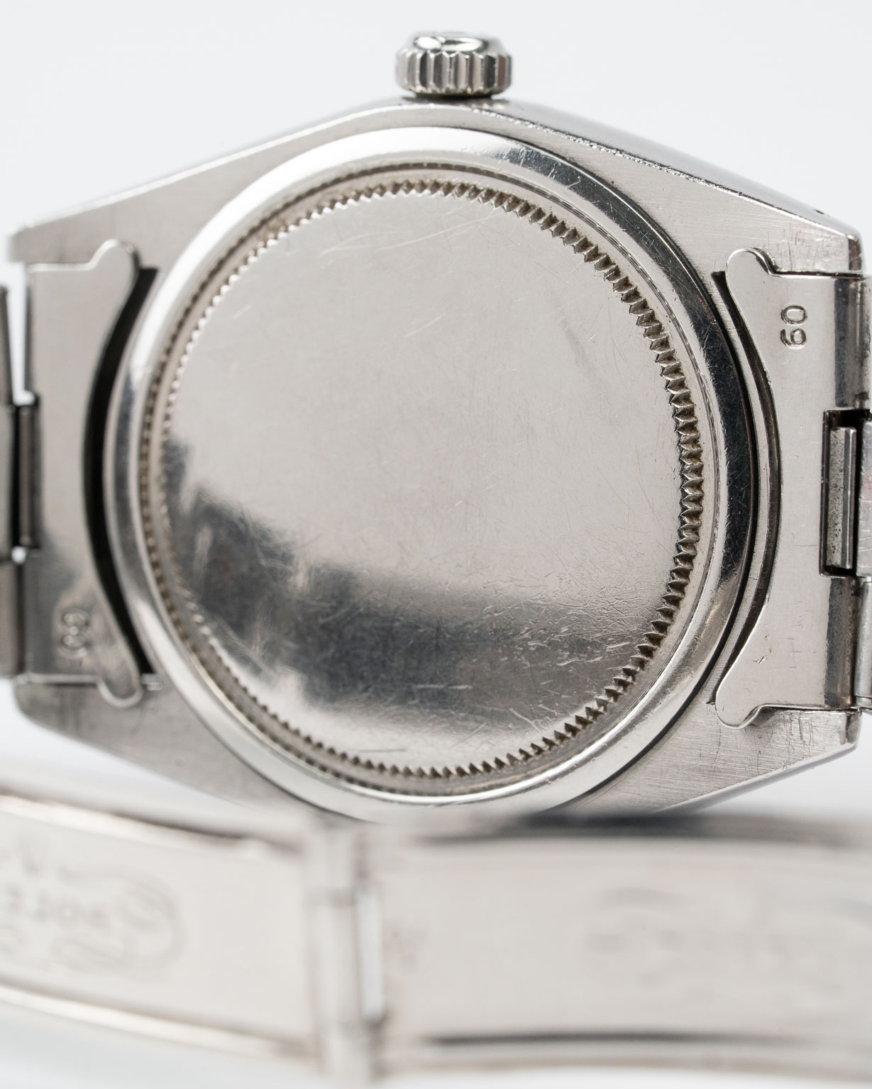 Vintage Rolex Oysterdate Precision 6694 stainless steel Black Gilt (tropical) dial on riveted oyster from 1953 caseback