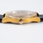 Omega Genève 136.0102 gold plated, full set from 1975 crown side